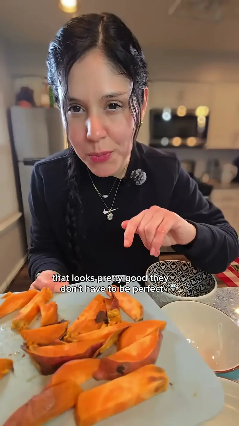 Crystal pointing at a plate of hand-cut sweet potato wedges